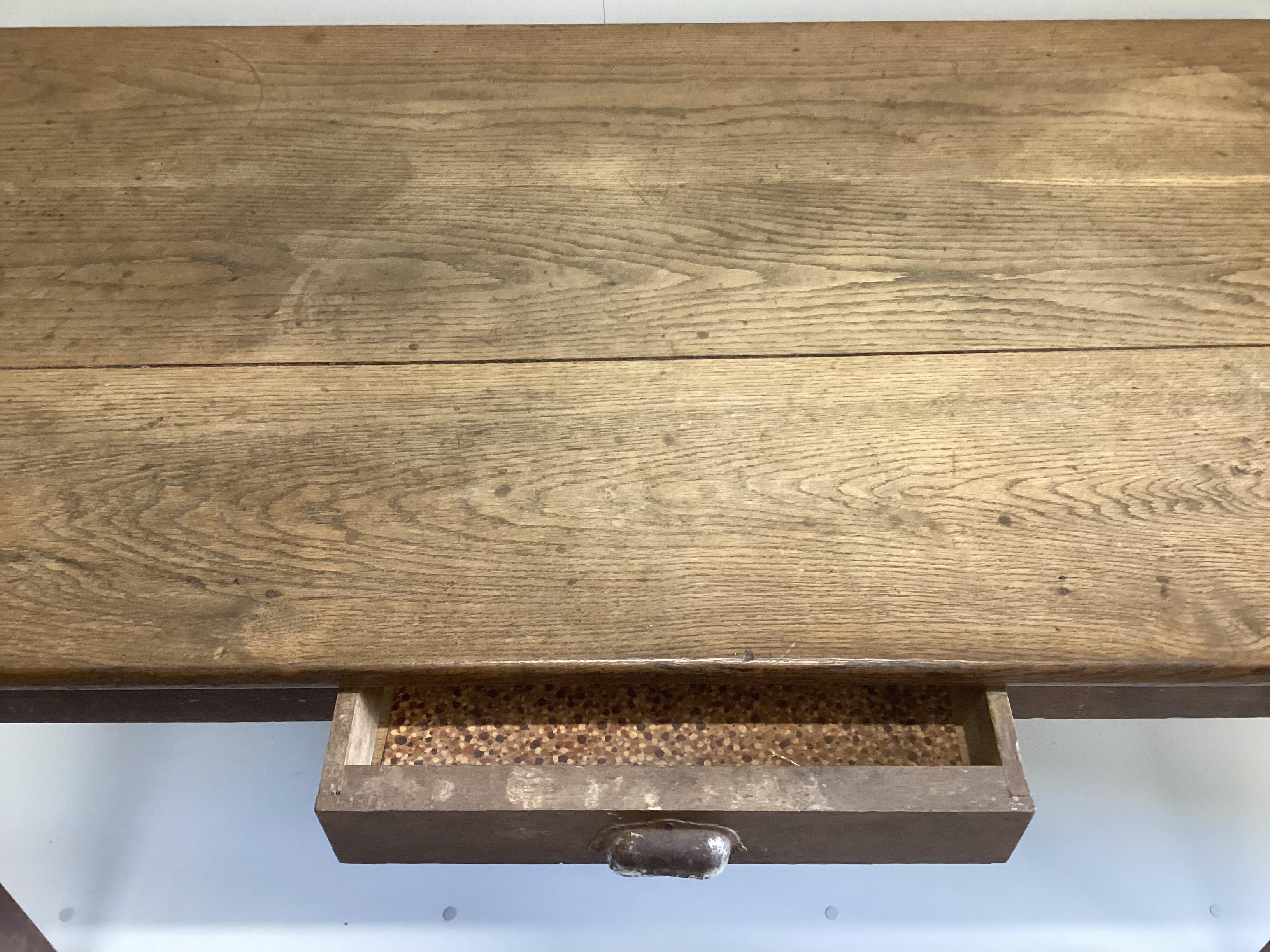 A 19th French rectangular oak kitchen table, width 139cm, depth 76cm, height 74cm